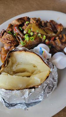 Stir fry ribeye with baked potato