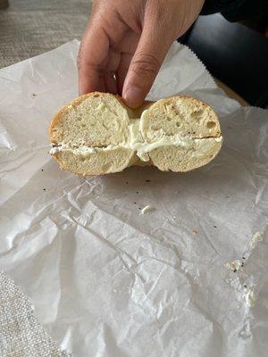 Poppy seed bagel with cream cheese