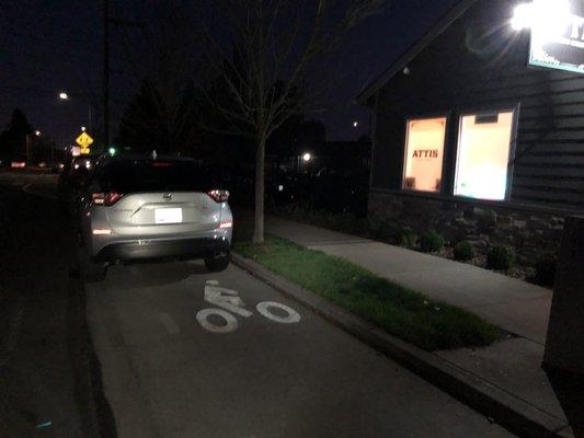 one of three cars, another in front and behind this car