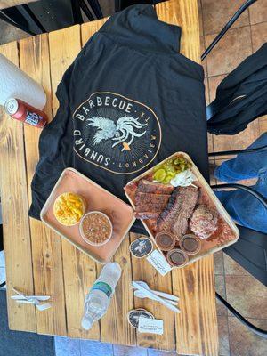 Over view of 3 meat plate pork ribs, pulled pork and brisket