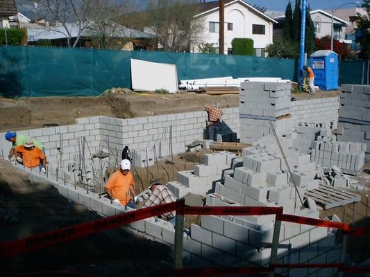 Design|Build| Garage Masonry Retaining Walls |Cedar Condos