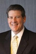 JOHN W. PHILLIPS, Shareholder