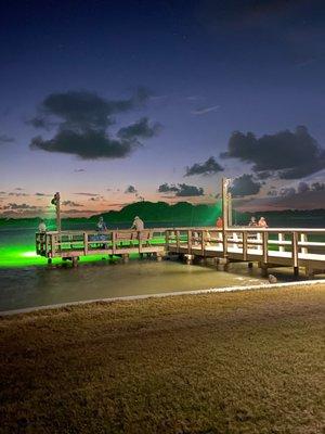 One of the two green lit piers