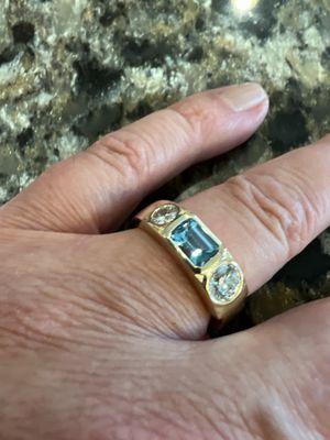 Custom ring by K Norris Jewelers.