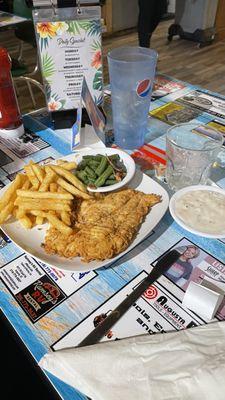 Chicken fried chicken, gravy on side.