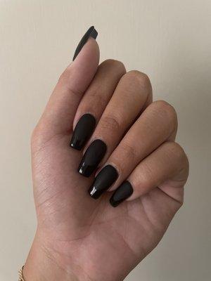 It's October so Halloween themed, matte black acrylics with glossy tips.