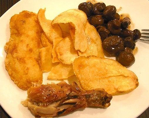 A sampler dish assembled from the buffet: fish, freshly-cooked chips, roast chicken, burgundy mushrooms.