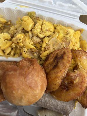 Ackee and saltfish with fried dumpling, boiled banana, and fried plantain.