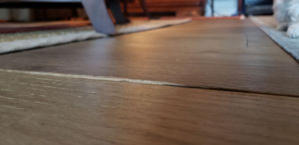 Engineered hardwood flooring with defects.