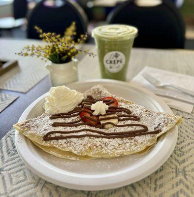 Strawberry banana crepe with Nutella and unsweetened iced matcha latte