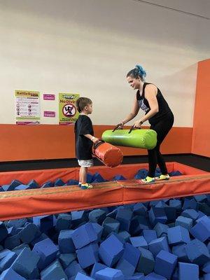 Foam pit with jousting