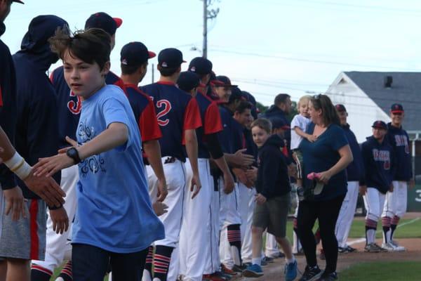 Run the bases on Sundays and high-five players on your way to home plate!