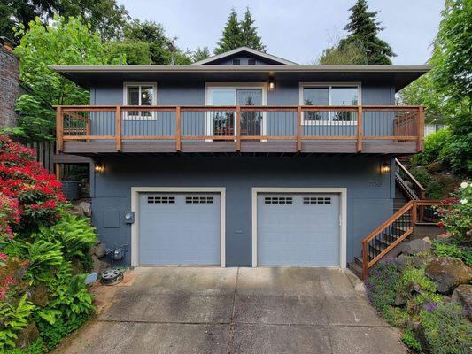 Steps and decks, composite decking with custom cedar railings, low voltage lighting and exterior paint