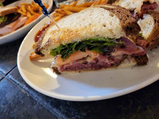 Pastrami sandwich, club sandwich with added turkey.