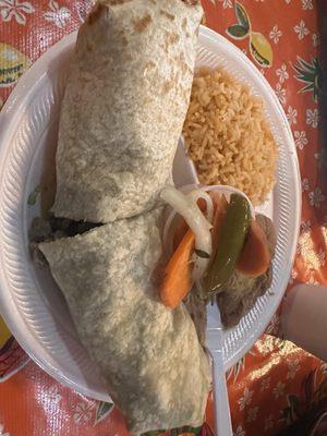 Asada burrito so big I had to cut it in half. Best refried beans I've had in a long time.