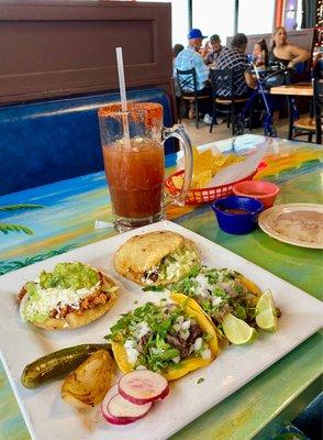 Sope tinga, gordita pastor, tacos lengua; frioles and michelada