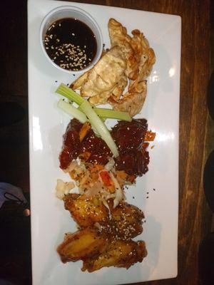 Asian sampler, chicken potstickers, barbecue pork wings and sweet 
 chili wings  w/ coleslaw