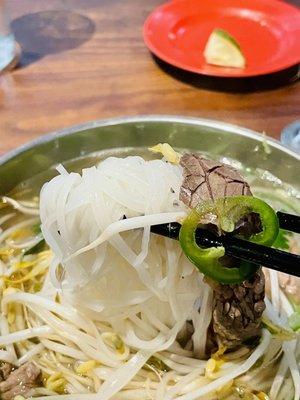 Rice noodles swimming in delicious Phõ broth!