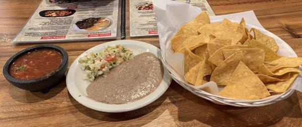 Chips, salsa, beans and slaw mix