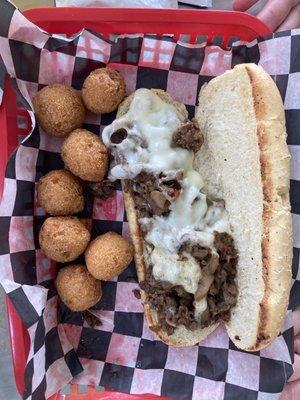 Philly cheese steak with hush puppies