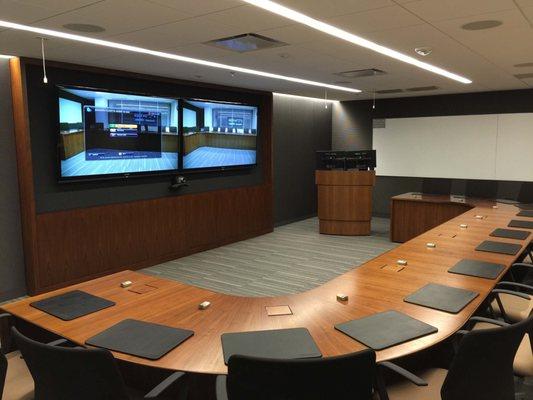 AV Board Room - AV conference room with Polycom Video conference system  and Crestron