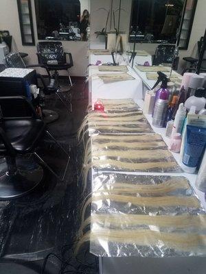 Making blonde platinim hair extensions..