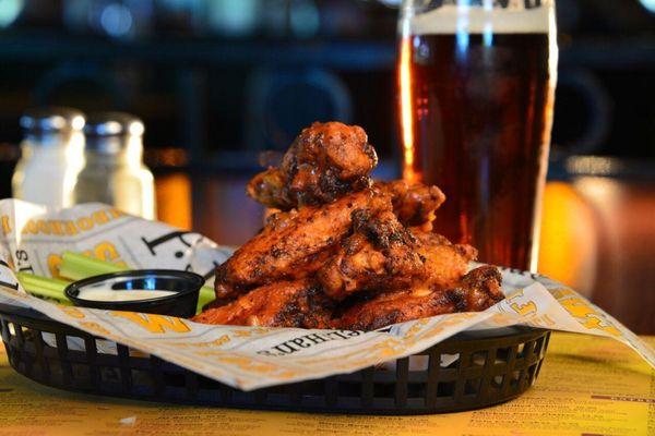 P.J.'s Famous, Fresh Never Frozen "Naked Style" Wings. Available in 13 signature sauces including our always-rotating Wing of the Month!!