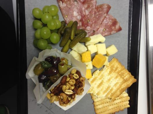 ZIVIX Picnic Plate with meats, cheeses, crackers and pickles and Nuts & Olives.