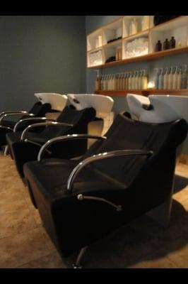 Relaxing shampoo room, where guests receive a customized shampoo experience as well as a complimentary scalp and neck massage.