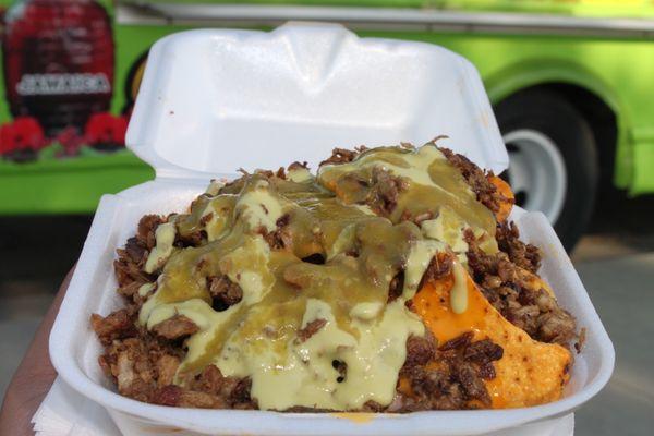 Custom nachos with asada guacamole sauce and salsa verde Photos by A.A.Serrano.Photography on ig