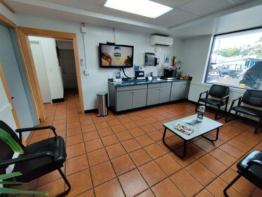 This is the second waiting room at the upper building. The restrooms are outside and to the right.