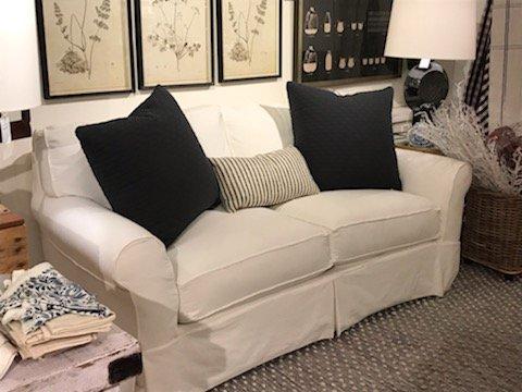 Don't be afraid of white furniture - when it's slipcovered, you can throw it in the wash.