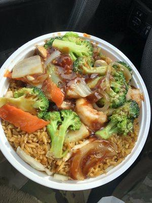 Shrimp with mixed veggies and chicken fried rice. Steaming hot and plenty of shrimp.