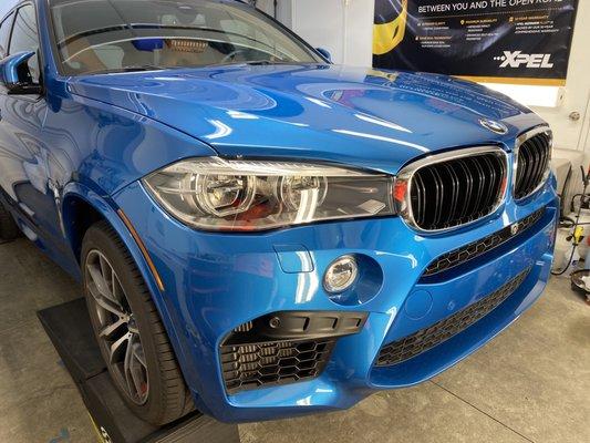 BMW X5M receiving our Full Front Package Installation. Film of choice, XPEL Ultimate Plus. Love the gloss!!!