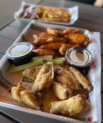 15 bone in chicken wings with seasoned fries $30 not worth it.