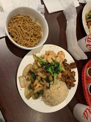 Shrimp n chicken teriyaki with garlic rice, side of yakisoba noodles n sautéed onions n squash