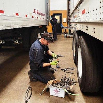 Tire inflation system getting fixed and maintained.