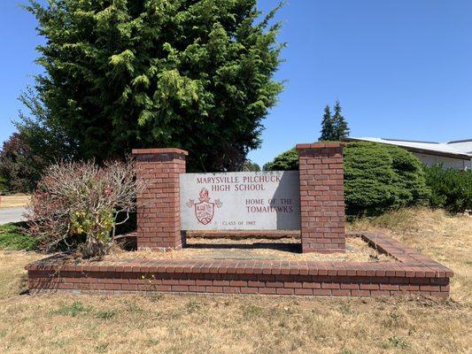 Main sign by the parking lot.