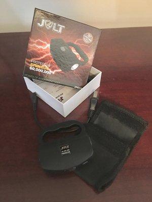 Jolt 60M Knuckle Stun Gun and accessories, as received from company.