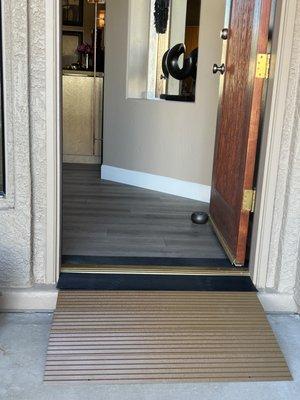 Wheelchair accessible ramp at front door.