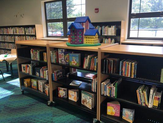 Board books in children's room.