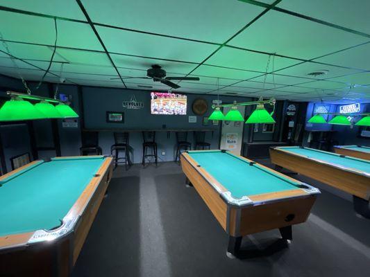 Tv, pool tables, new flooring and ceiling