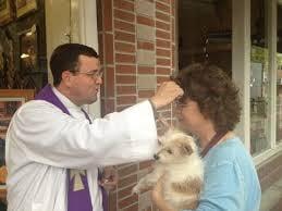 Father Rob taking Ashes to Go downtown on Ash Wednesday