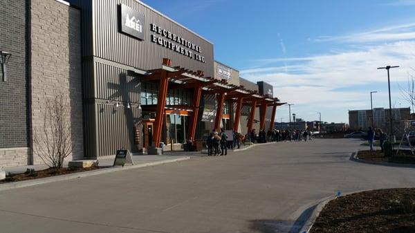 Grand opening day. The line is all the way around the back of the building.   Welcome to Des Moines, REI.