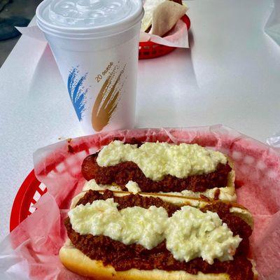 Jumbo dogs with sauce and slaw. Sauce us sweet style and tasty.