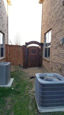 Steel braced, arch cut with header Grade 1 Cedar Pre-stained.