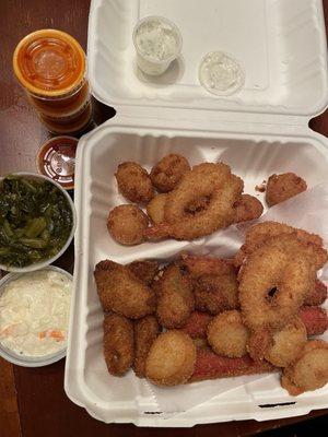 #16 fried shrimp, scallops, oysters, crab & hush puppies. Side of Cole slaw & collard greens