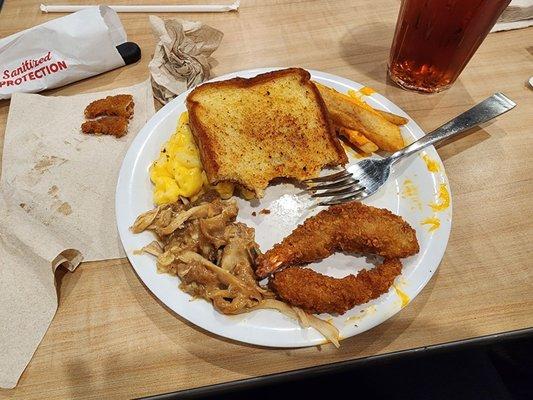 Buttered toast, Mac and cheese, fries, chicken with gravy, and fried shrimp.