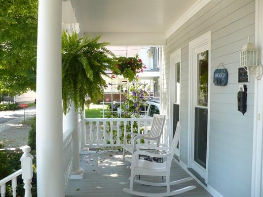 Sit on the porch in one of the rocking chairs, sipping lemonade or wine, listening to the soothing chirp of the birds.