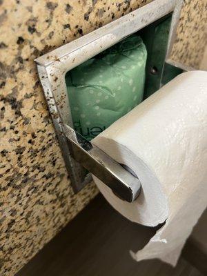 Rusted tissue holder.